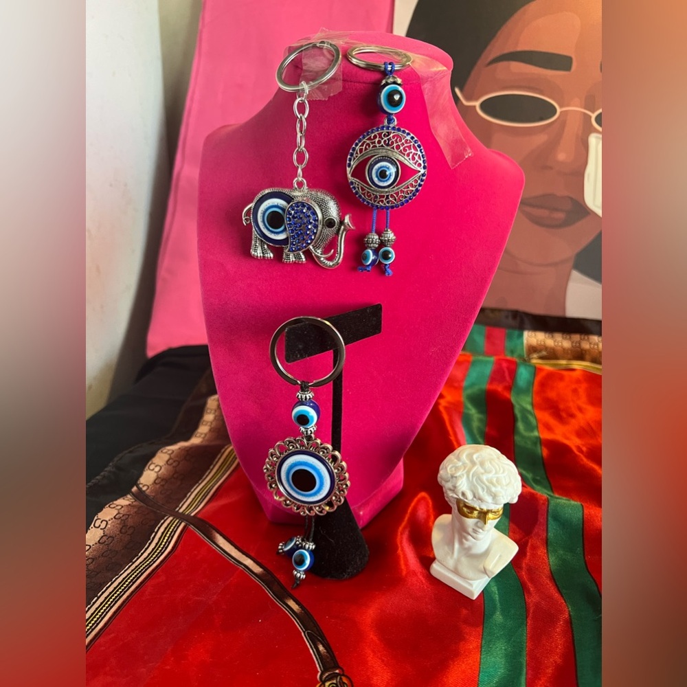 Collection of 3 vintage decorative third eye/ evil eye keychains or purse charm